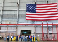 Members of the Friends of Hickam walk through the 15th Maintenance group during a tour of Joint Base Pearl Harbor-Hickam, March 31, 2016. The tour highlighted some of the 15th Wings agencies including Security Forces, Explosive Ordines Disposal, Maintenances and the 15th Medical Group. The Friends of Hickam serve as facilitators between the 15th Wing command and the Hawaii community. The purpose of the Friends of Hickam is to provide public support for the U.S. Air Force in Hawaii and its missions. They also help to improve the quality of life for Air Force personnel and their families. (U.S. Air Force photo by Tech. Sgt. Aaron Oelrich/released) 