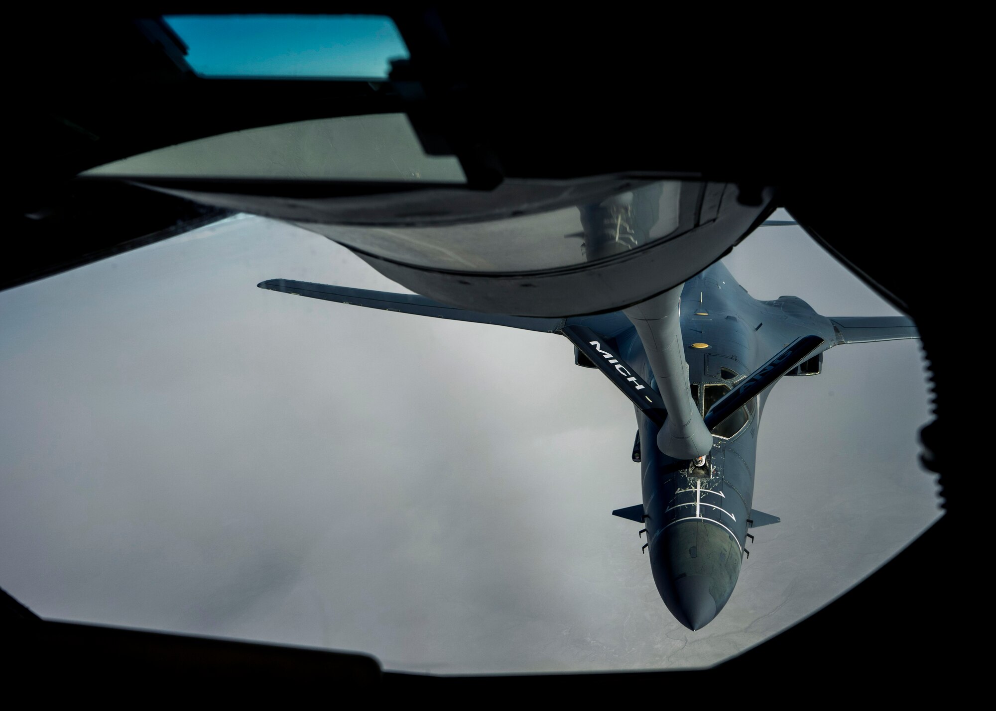 A KC-135 Stratotanker assigned to the Michigan Air National Guard’s 171st Air Refueling Squadron refuels a B-1 bomber from the 28th Bomb Wing at Ellsworth Air Force Base, S.D., April 1, 2016. The KC-135 provides the core aerial refueling capability for long range strike assets like the B-1. (U.S. Air Force photo by Senior Airman Rebecca Imwalle/Released)