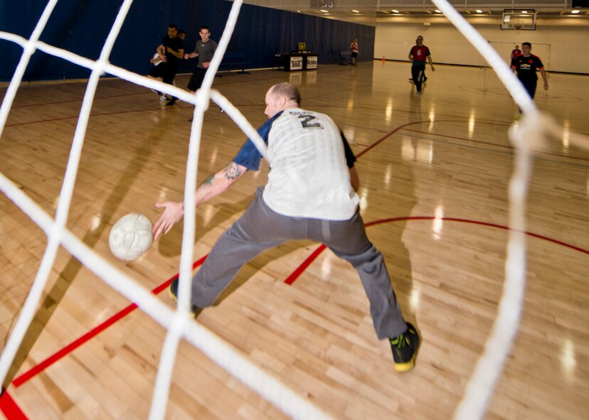 Team Minot Airmen competed against each other for the Commander’s Cup during the 2016 Winter Games at Minot Air Force Base, N.D., March 23, 2016.  Some of the team competitions included volleyball, dodgeball, basketball, water polo, soccer and a rock climbing relay. The games also hosted individual challenges such as rowing, benching and burpees. (U.S. Air Force photo/Airman 1st Class J.T. Armstrong) 