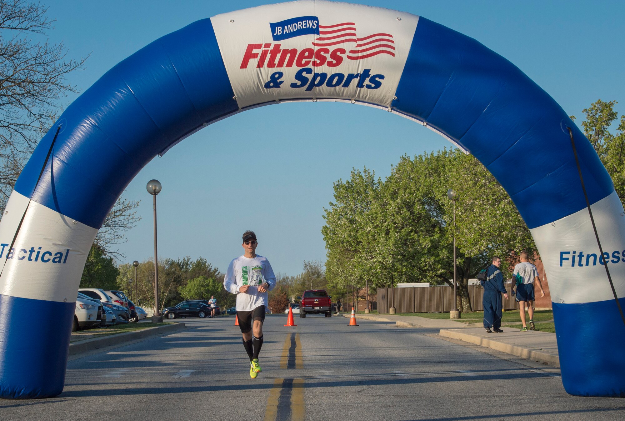 Chris Zabriski, 5k participant, was the first male finisher of the second annual “Consent to Color” 5k on Joint Base Andrews, Md., April 4, 2016. Zabriski finished with a time of 21 minutes and 11 seconds. (U.S. Air Force photo by Senior Airman Ryan J. Sonnier/RELEASED)