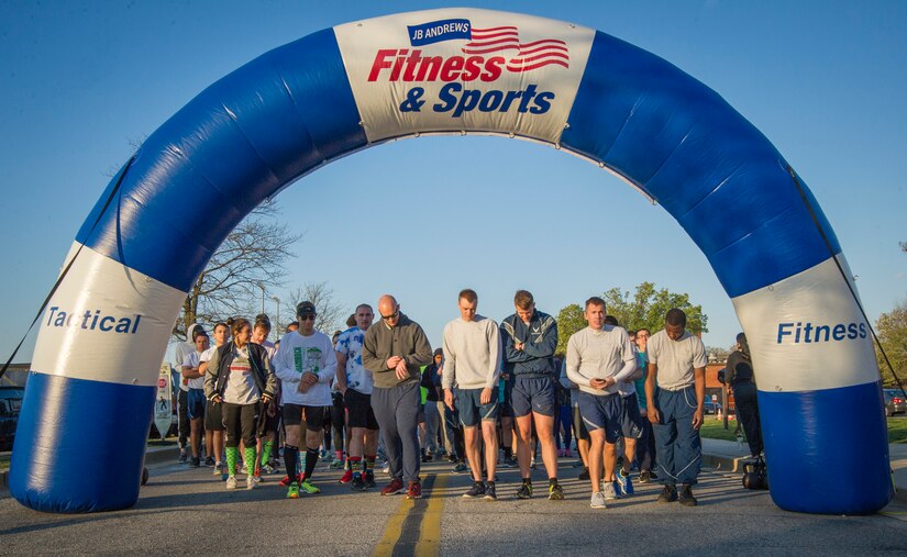 Joint Base Andrews members line-up prior to the start of a 5k here, April 4, 2016. The second annual “Consent to Color” run was held for Sexual Assault Awareness month. (U.S. Air Force photo by Senior Airman Ryan J. Sonnier/RELEASED)