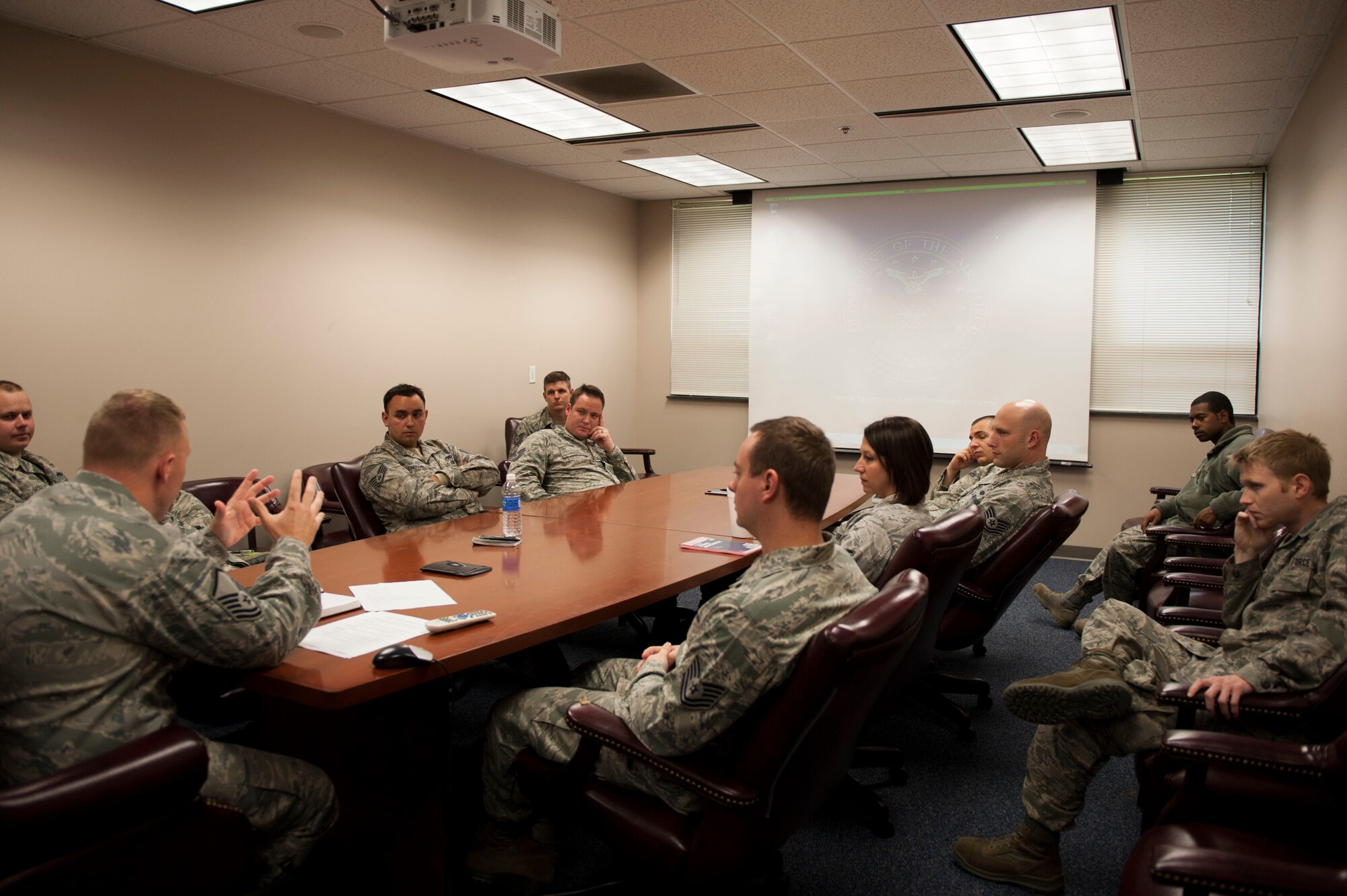 Members of the 314th Aircraft Maintenance Squadron discuss the topic of excellence as part of the Profession of Arms Center of Excellence program March 23, 2016, on Little Rock Air Force Base, Ark.  The eight primary topics of PACE are commitment, core values, excellence, loyalty, mutual respect, oath, selflessness and trust. (U.S. Air Force photo by Senior Airman Stephanie Serrano)