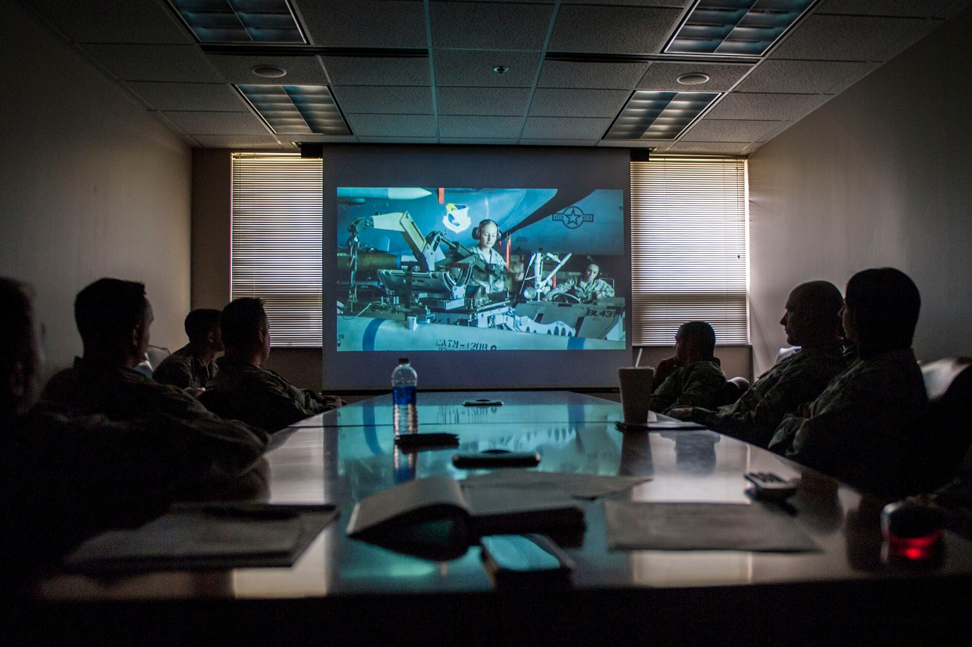 Members of the 314th Aircraft Maintenance Squadron watch the Profession of Arms Center of Excellence video March 23, 2016, on Little Rock Air Force Base, Ark. The PACE program is an option for U.S. Air Force members to become the best possible leaders. (U.S. Air Force photo by Senior Airman Stephanie Serrano)