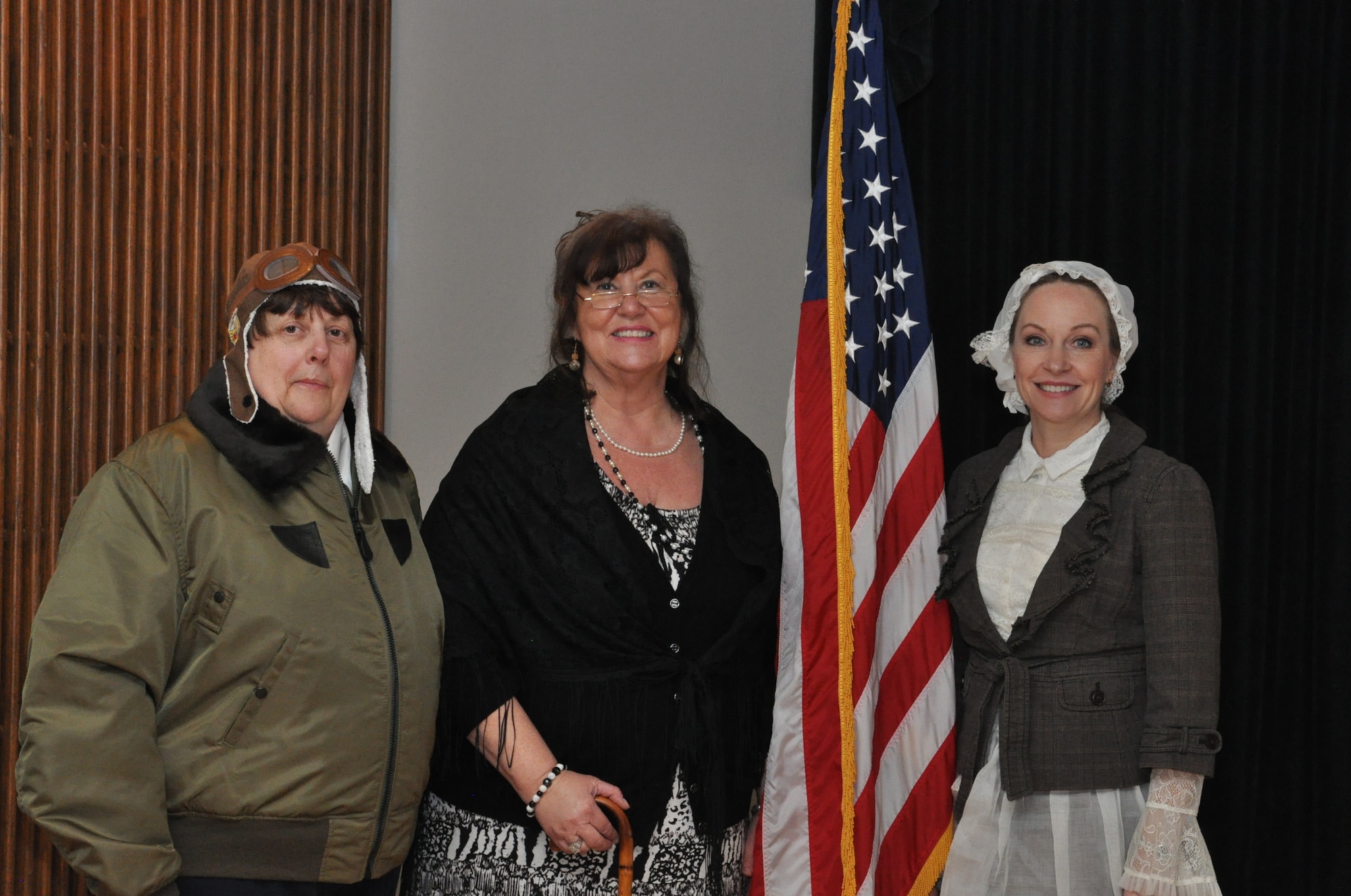 Jacqueline Cochran, Eleanor Roosevelt and Florence Nightingale participated in the Women's History Month Luncheon March 23 at the Wright-Patt Club. Portraying the female icons were Linda Canter, Dinah Luneke and Gina Martinelli, (from left), all from the Air Force Life Cycle Management Center and members of a Wright-Patterson AFB Toastmasters Club. (U.S. Air Force photo/Gina Marie Giardina)