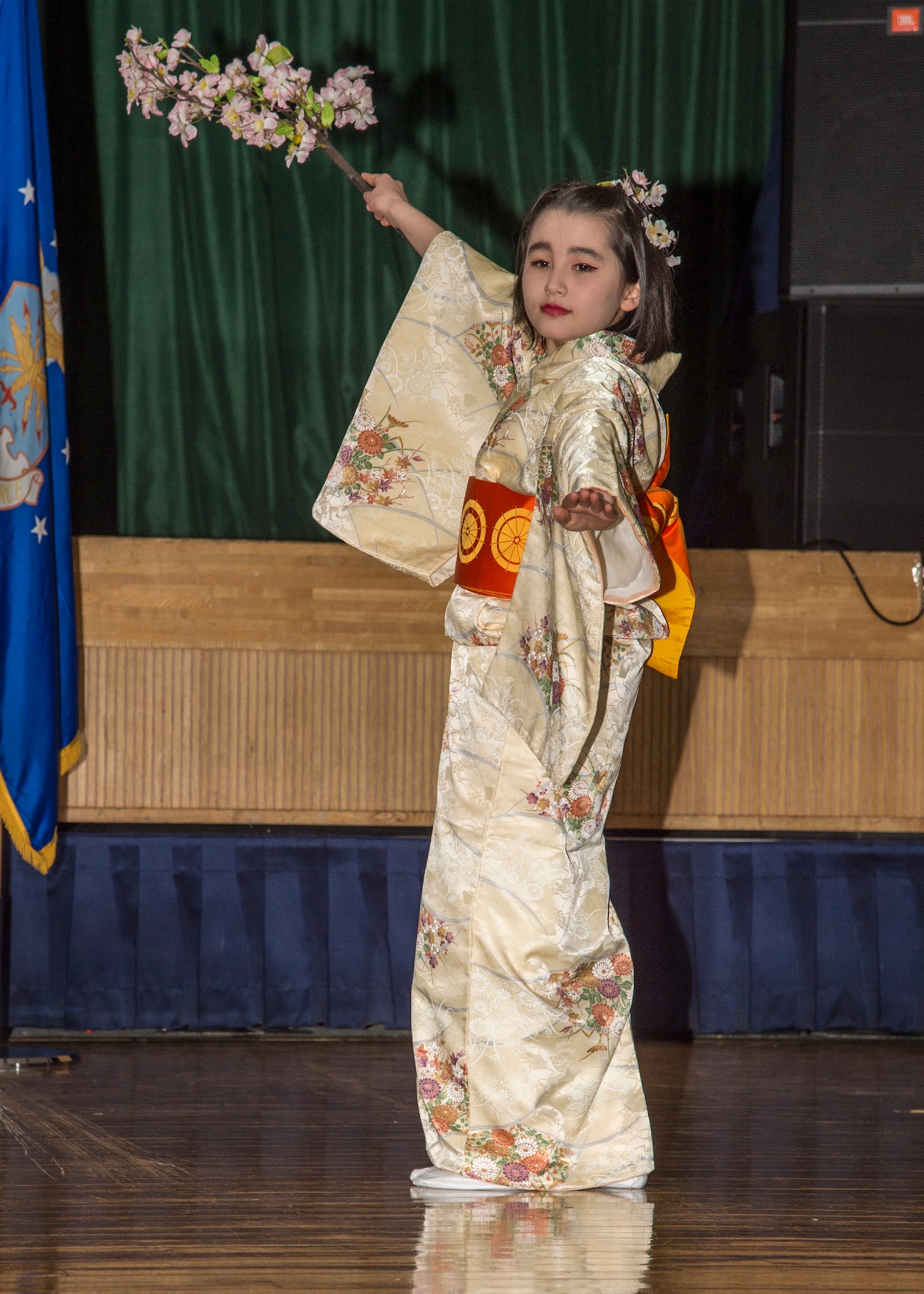 A 29th Annual Japan Day performer conducts a traditional Japanese dance at Misawa Air Base, Japan, April 2, 2016. Dozens of performances took place to highlight and recognize Japanese traditions throughout the day. (U.S. Air Force photo by Airman 1st Class Jordyn Fetter)