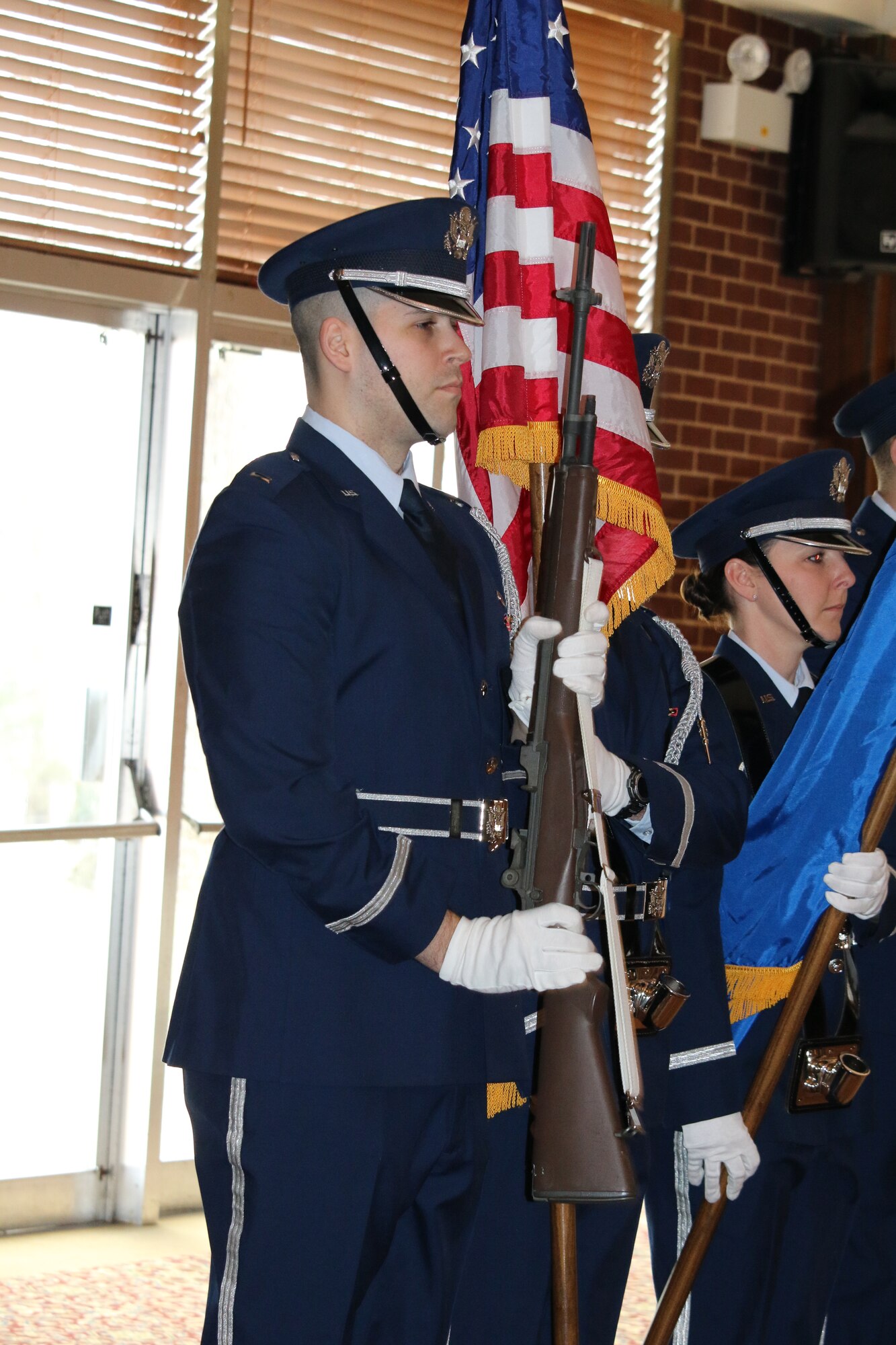First Lt. Chris Handy, AEDC flight systems engineer, recently won the Air Force Test Center Annual Award for Company Grade Officer for 2015.  Among his other duties, Handy is an active member of the AEDC Honor Guard. He is pictured here as a member of the detail which posted colors at a recent ceremony at the Arnold Lakeside Center. (U.S. Air Force photo/Holly Fowler)
