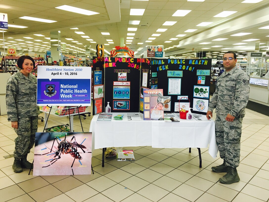 National Public Health Week was held from April 4-10, 2016.  Senior Airman Larue Penka and Senior Airman Branden Lombardo from the 779 MDG Public Health Flight, manned a display table at the Joint Base Andrews, Base Exchange on April 4.  They provided information on the Zeka virus, hepatititis, proper hand washing and food safety to shoppers in the store. (Photo by Tech. Sgt. William Crenshaw/Released)