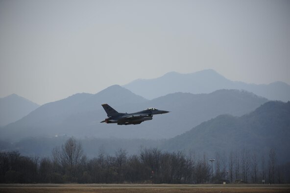 An F-16 Fighting Falcon from the 80th Fighter Squadron takes off during Buddy Wing 16-3 at Jungwon Air Base, South Korea, March 30, 2016. Buddy Wing training, held multiple times a year, polishes the ability of the South Korean and U.S. pilots to train and operate as a combined force. (U.S. Air Force photo/Staff Sgt. Nick Wilson)