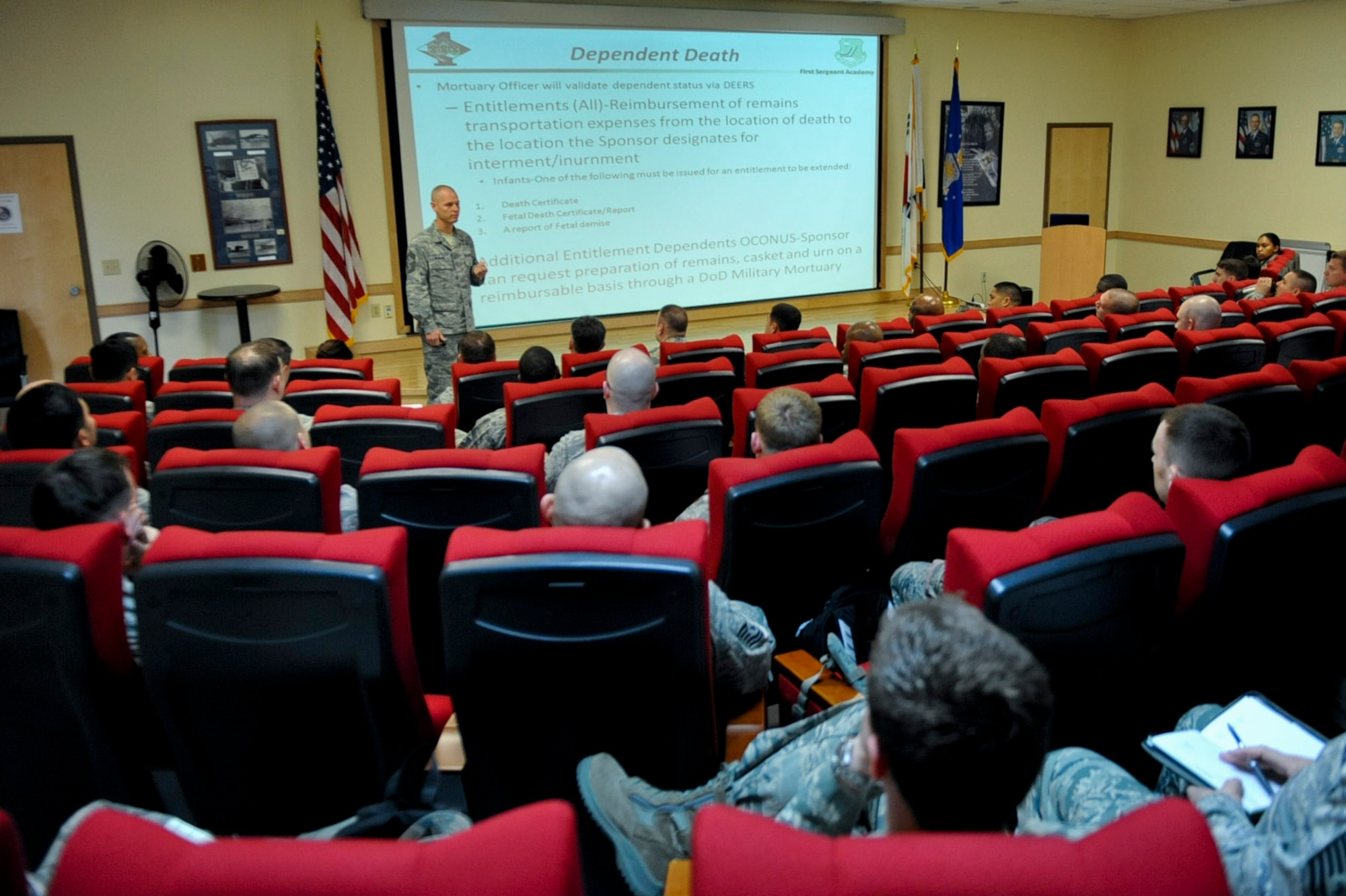 Chief Master Sgt. Kevin Newsom, 51st Aircraft Maintenance Squadron first sergeant, briefs about death notifications at the first sergeant symposium at Osan Air Base, Republic of Korea, March 30, 2016. The four-day symposium provided perspective and knowledge of first sergeant responsibilities like counseling, administrative reprimands and death notifications. (U.S. Air force photo by Staff Sgt. Jonathan Steffen/Released)