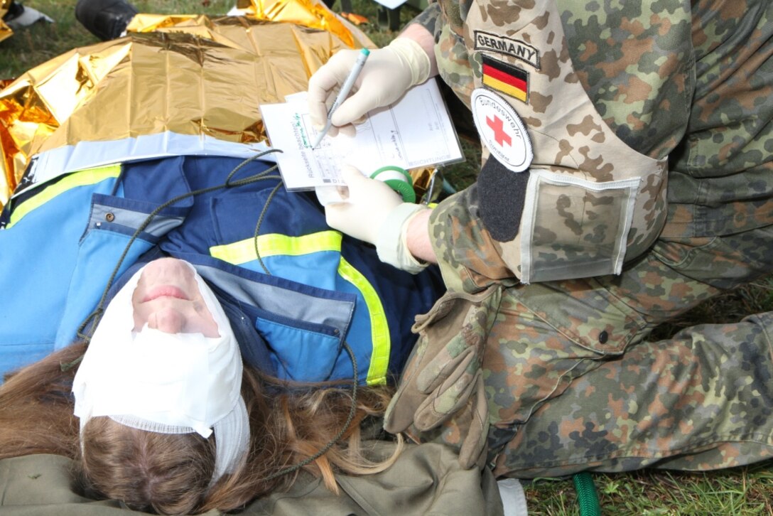 WACKERNHEIM, Germany- Soldiers of 361st Civil Affairs Brigade, 7th Mission Support Command trained with Bundeswehr Soldiers, members of the German Red Cross and civilian volunteers for the German Technical Assistance Service (Technische Hilfswerk) in a contingency operation excercise held at the 7th U.S. Army Joint Training Command Training Support Center, Wiesbaden on April 2, 2016. (Photo by Sgt. Daniel Friedberg, 7th Mission Support Command Public Affairs Office)