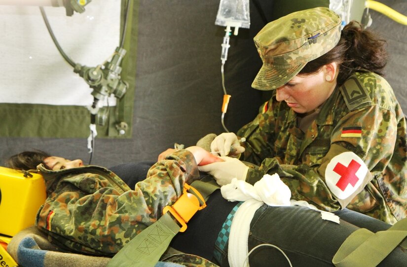 WACKERNHEIM, Germany- Soldiers of 361st Civil Affairs Brigade, 7th Mission Support Command trained with Bundeswehr Soldiers, members of the German Red Cross and civilian volunteers for the German Technical Assistance Service (Technische Hilfswerk) in a contingency operation excercise held at the 7th U.S. Army Joint Training Command Training Support Center, Wiesbaden on April 2, 2016. (Photo by SGT Daniel Friedberg, 7th Mission Support Command Public Affairs Office)