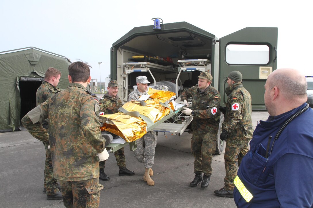 WACKERNHEIM, Germany- Soldiers of 361st Civil Affairs Brigade, 7th Mission Support Command trained with Bundeswehr Soldiers, members of the German Red Cross and civilian volunteers for the German Technical Assistance Service (Technische Hilfswerk) in a contingency operation exercise held at the 7th U.S. Army Joint Training Command Training Support Center, Wiesbaden on April 2, 2016. (Photo by Maj. Daryle Sewell, 7th Mission Support Command Public Affairs Office)