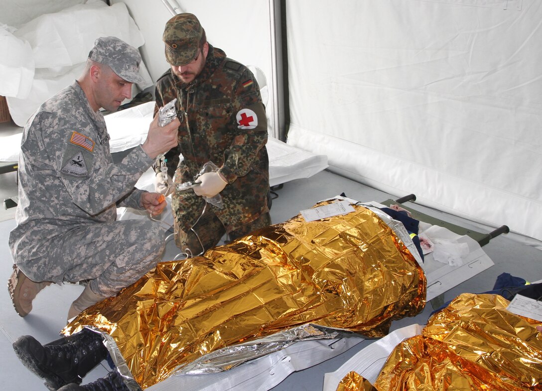 WACKERNHEIM, Germany- Soldiers of 361st Civil Affairs Brigade, 7th Mission Support Command trained with Bundeswehr Soldiers, members of the German Red Cross and civilian volunteers for the German Technical Assistance Service (Technische Hilfswerk) in a contingency operation exercise held at the 7th U.S. Army Joint Training Command Training Support Center, Wiesbaden on April 2, 2016. (Photo by Maj. Daryle Sewell, 7th Mission Support Command Public Affairs Office)