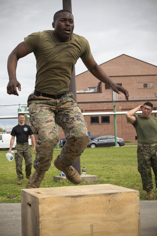 Marine Corps Sgt. Donovan Robinson does box jumps during the Commanding General's Fitness Cup challenge at Marine Corps Recruit Depot Parris Island, S.C., March 25, 2016. Robinson is a supply clerk assigned to Weapons and Field Training Battalion, Recruit Training Regiment. Marine Corps photo by Lance Cpl. Richard Currier
