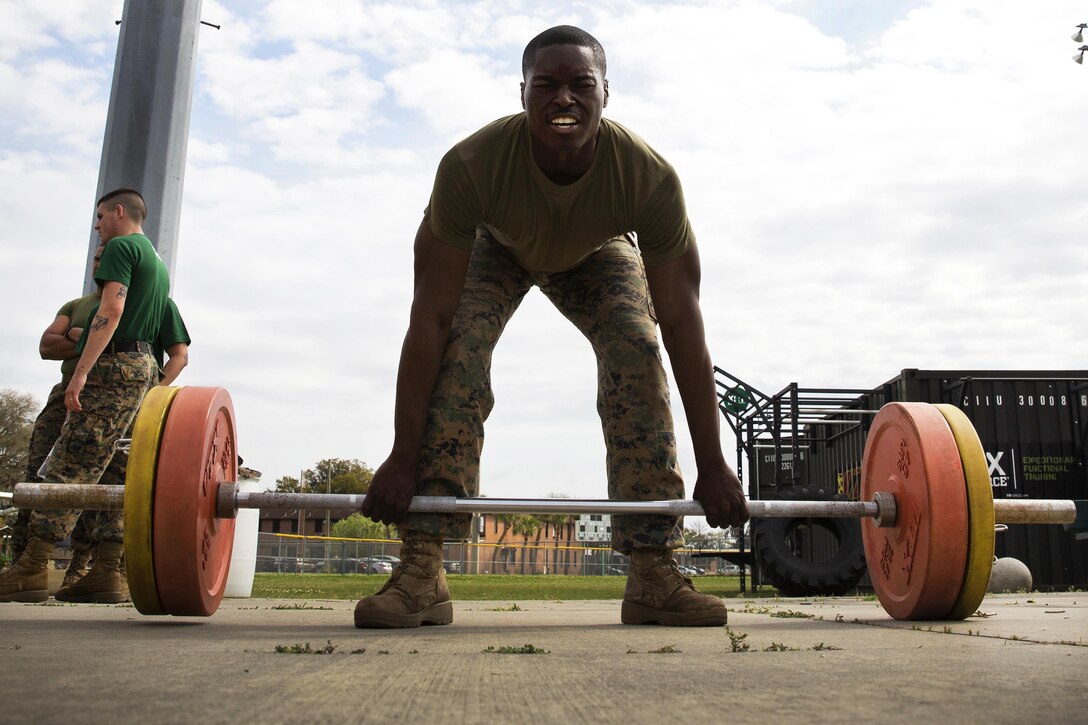 Marine Corps Sgt. Donovan Robinson participates in the dead lifts event during the Commanding General's Fitness Cup challenge at Marine Corps Recruit Depot Parris Island, S.C., March 25, 2016. Robinson is a supply clerk assigned to Weapons and Field Training Battalion, Recruit Training Regiment. Marine Corps photo by Lance Cpl. Richard Currier