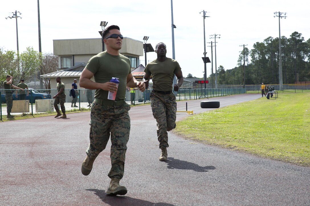 Marines run during the Commanding General's Fitness Cup challenge at Marine Corps Recruit Depot Parris Island, S.C., March 25, 2016. Marine Corps photo by Lance Cpl. Richard Currier