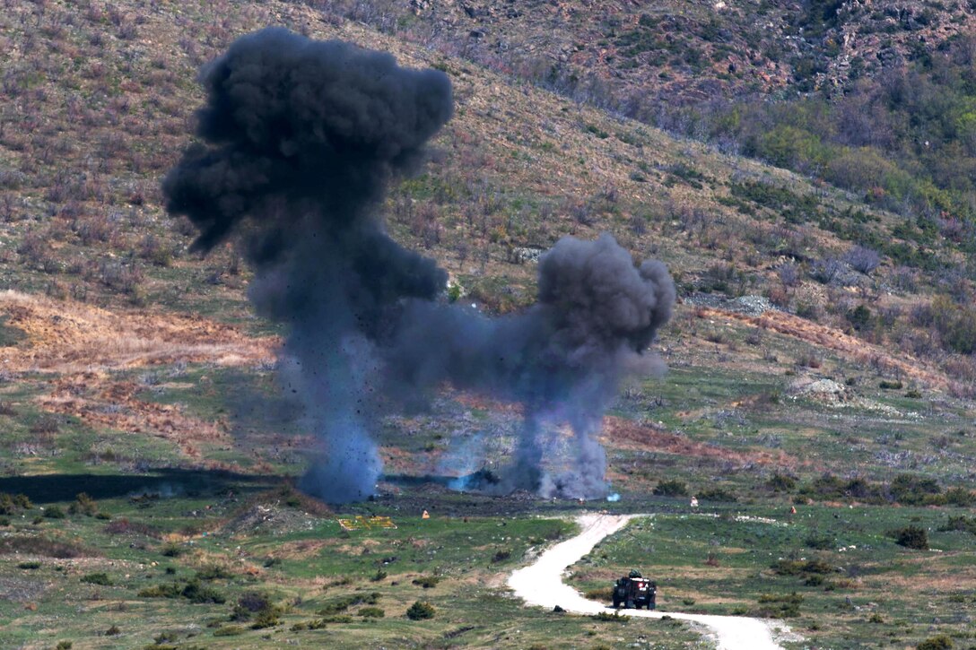 U.S and NATO soldiers detonate unexploded ordnance during a joint mine clearing operation at Orahovac Demolition Range in Kosovo, April 4, 2016. Army photos by Capt. Casey Martin