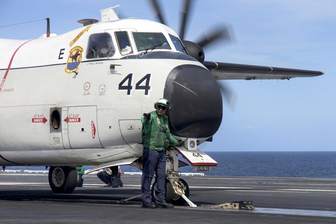 A C-2A Greyhound attached to Fleet Logistics Support Squadron 40 taxis onto a catapult on the flight deck of the aircraft carrier USS Dwight D. Eisenhower in the Atlantic Ocean, March 24, 2016. Crew members aboard the Eisenhower are training for deployment. Navy photo by Petty Officer 3rd Class Anderson W. Branch