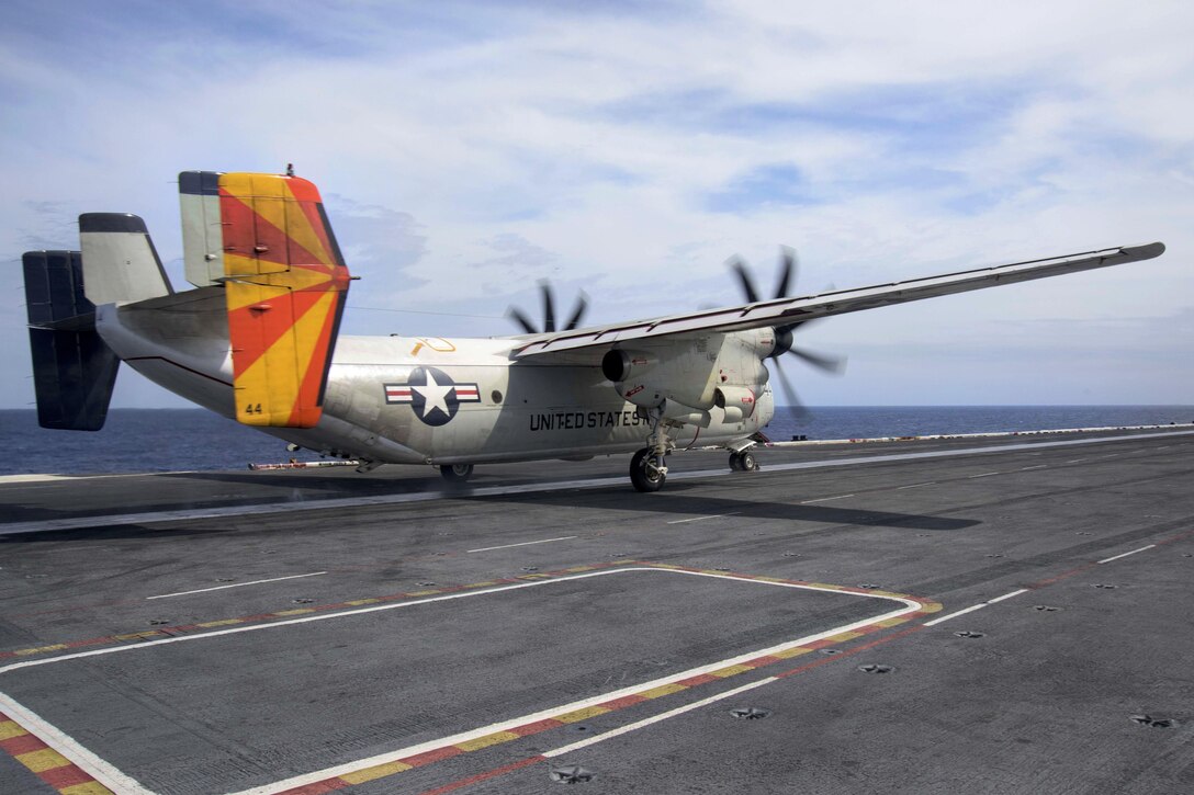 A C-2A Greyhound attached to Fleet Logistics Support Squadron 40 launches from the flight deck of the aircraft carrier USS Dwight D. Eisenhower in the Atlantic Ocean, March 24, 2016. Navy photo by Petty Officer 3rd Class Anderson W. Branch