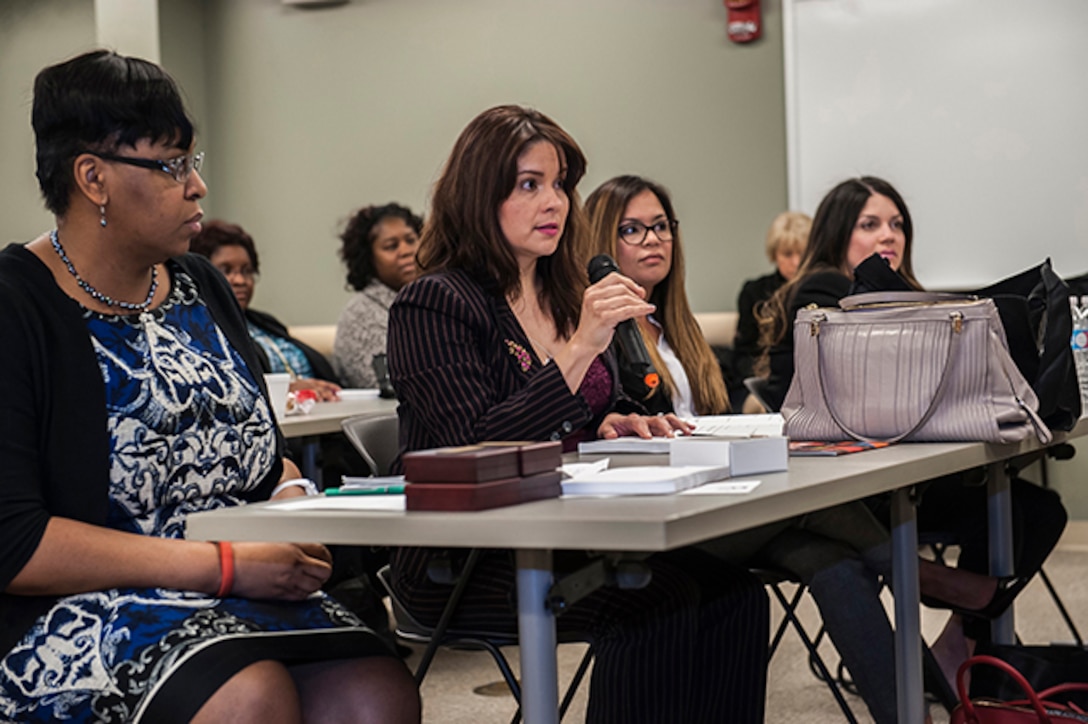 An attendee asks a question to a panelist at Defense Supply Center Columbus’ Women’s Leadership Summit March 23 in the Armed Forces Reserve Center (Building 2). The summit offered two workshops and a panel of four extraordinary women with diverse backgrounds in military, government and public service, sharing their career experiences to enable participants to enhance their leadership skills.  