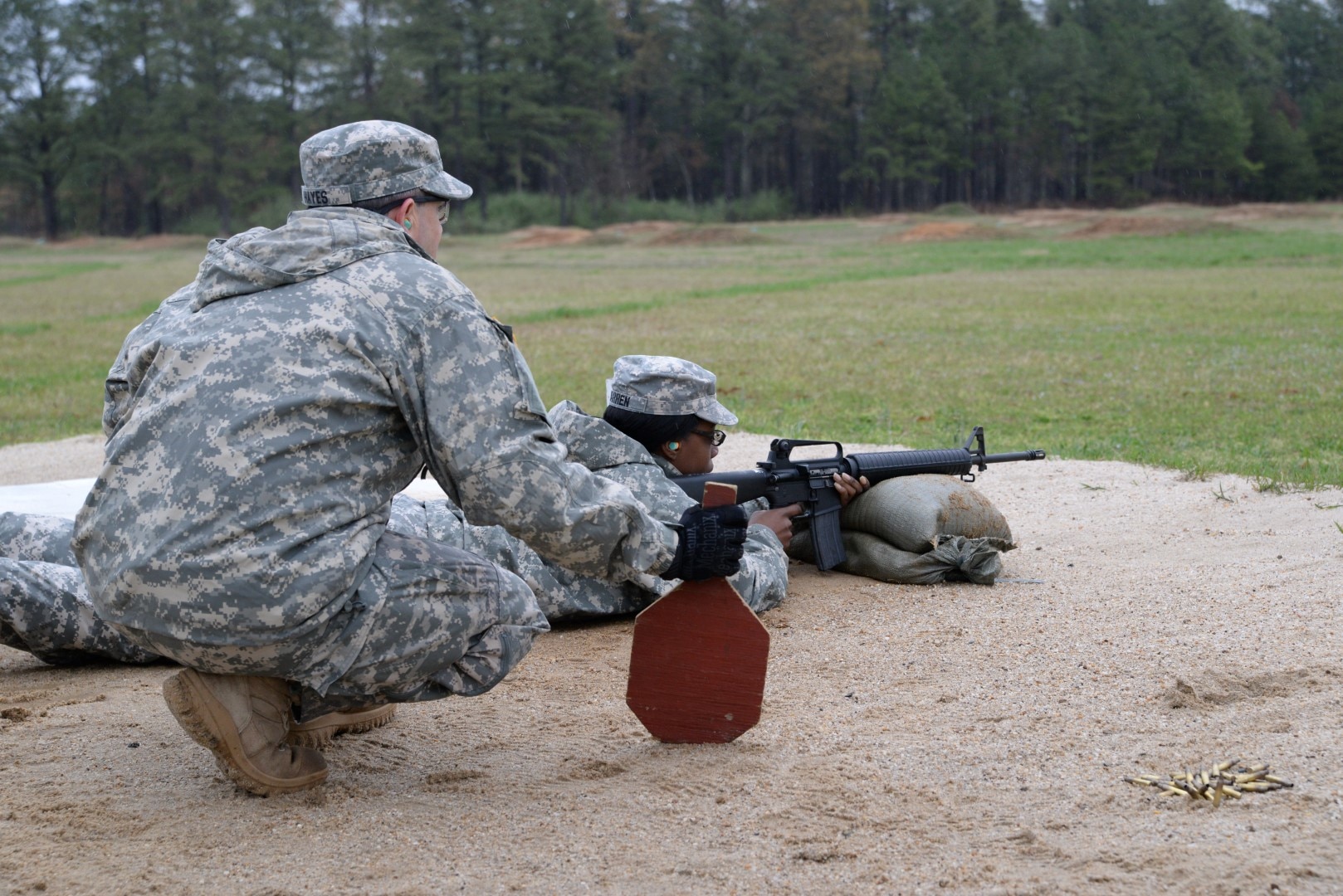 A DLA JRF member fires an M16 rifle during weapons training April 2 at Fort A.P. Hill, Va. The goal was to gain familiarization with the weapons for combat readiness and to qualify for deployments.