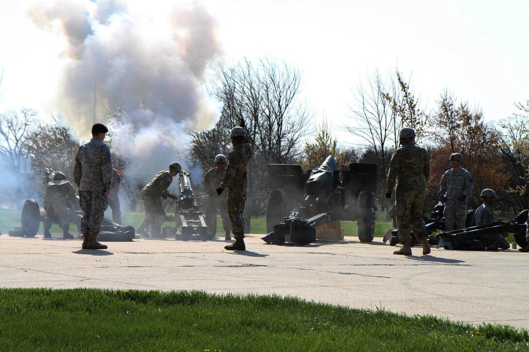 Canons roar during the 102nd Training Division (Maneuver Support) Change of Command ceremony to symbolically mark the tranfer of authority from outgoing commander Brig. Gen. John Elam to the 102nd's incoming commander, Brig. Gen. Miyako Schanely, at Ft. Leonard Wood, Mo., March 3, 2016.  The 102nd trains engineers, military police, and CBRN (chemical, biological, radiological, and nuclear) soldiers across the United States.