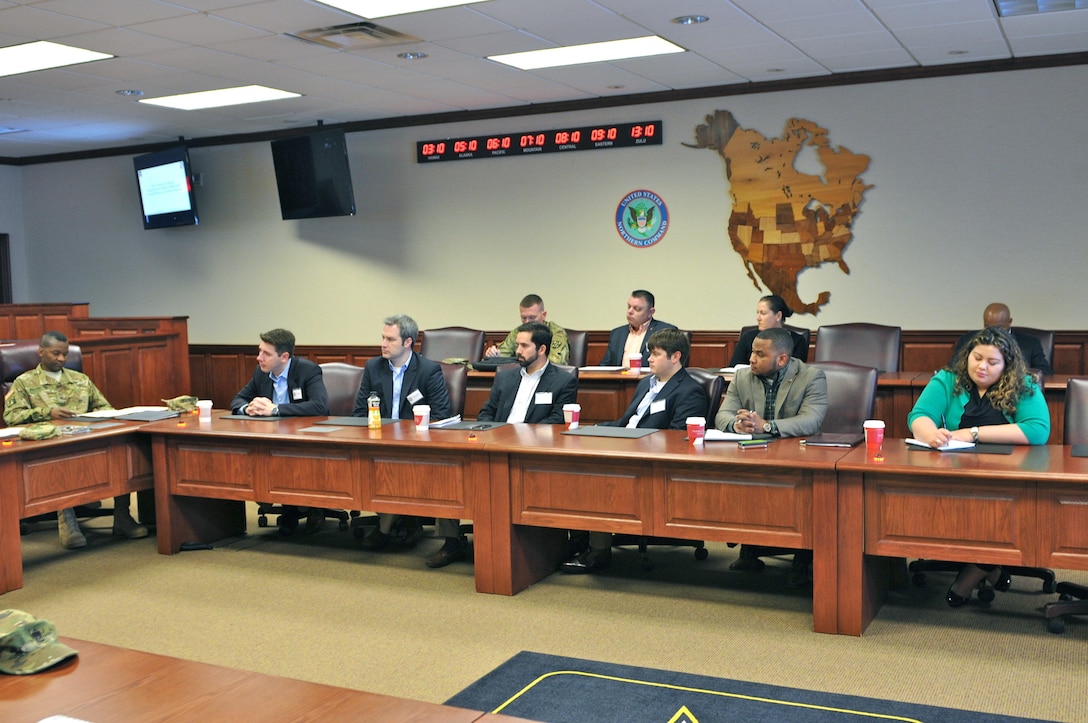 Staff Delegates from Washington D.C. listen intently during a brief, March 29, Fort Sam Houston, Texas. The delegates conducted a tour of Army Reserve facilities throughout Central Texas as part of a five day visit throughout the state, March 27 to April 1. 

Listening from left to right, Darrell Owens (second left), legislative assistant for Senator Pat Toomey (R-PA), James Baker (left), a senior legislative assistant, Tanner Black, immigration and border control security clerk for the Judiciary Committee, Jordan Ballard, legislative assistant for U.S. Representative Bill Flores (TX-17), Brandon Batch, legislative assistant for Michael McCaul (R-TX-10) and Priscila Abraham, a legislative assistant for Congresswoman Kathleen Rice, from New York’s fourth congressional district.