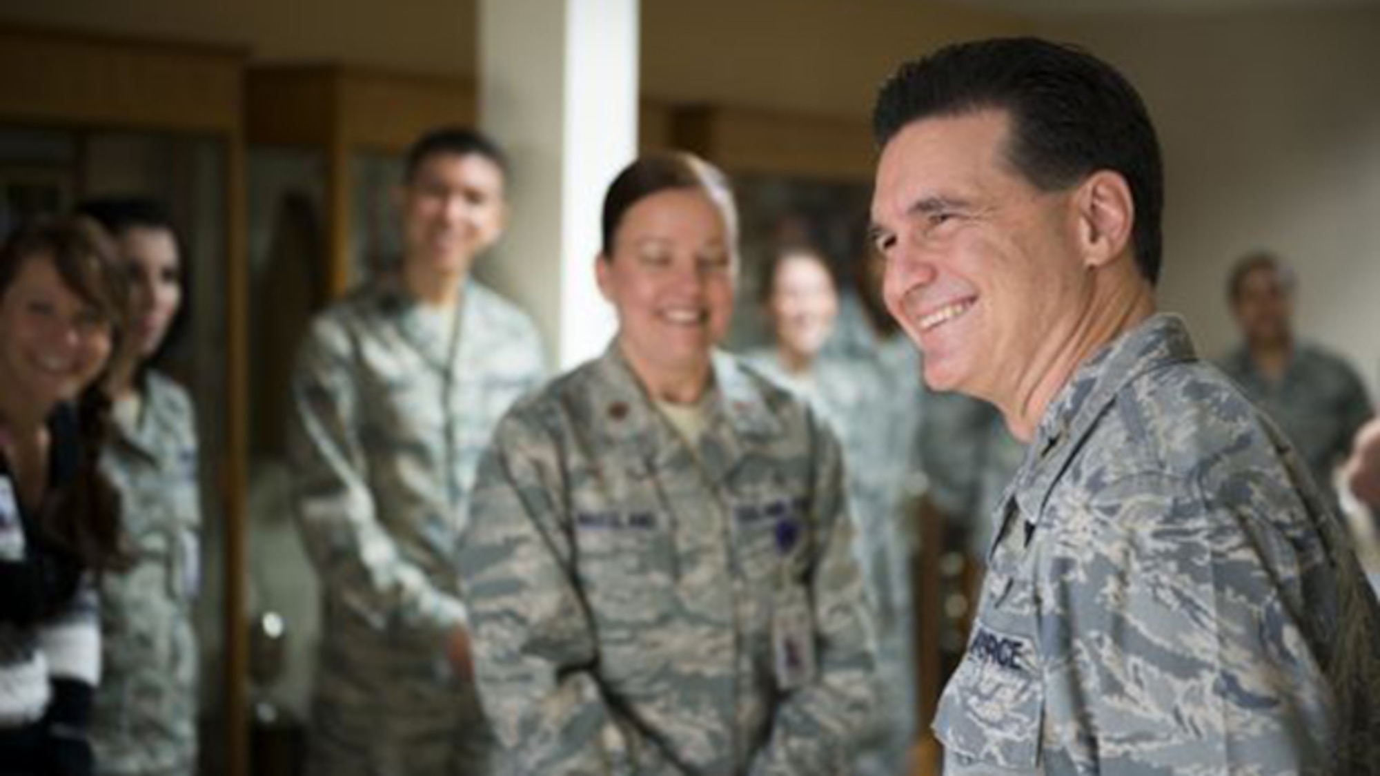 U.S. Air Force Brig. Gen. (Dr.) Sean Murphy, Air Combat Command surgeon general, jokes with Airmen from the 23rd Medical Group Nov. 19, 2014, at Moody Air Force Base, Ga. Murphy took over as the ACC surgeon general in September 2014. (U.S. Air Force photo by Airman 1st Class Ryan Callaghan/Released)