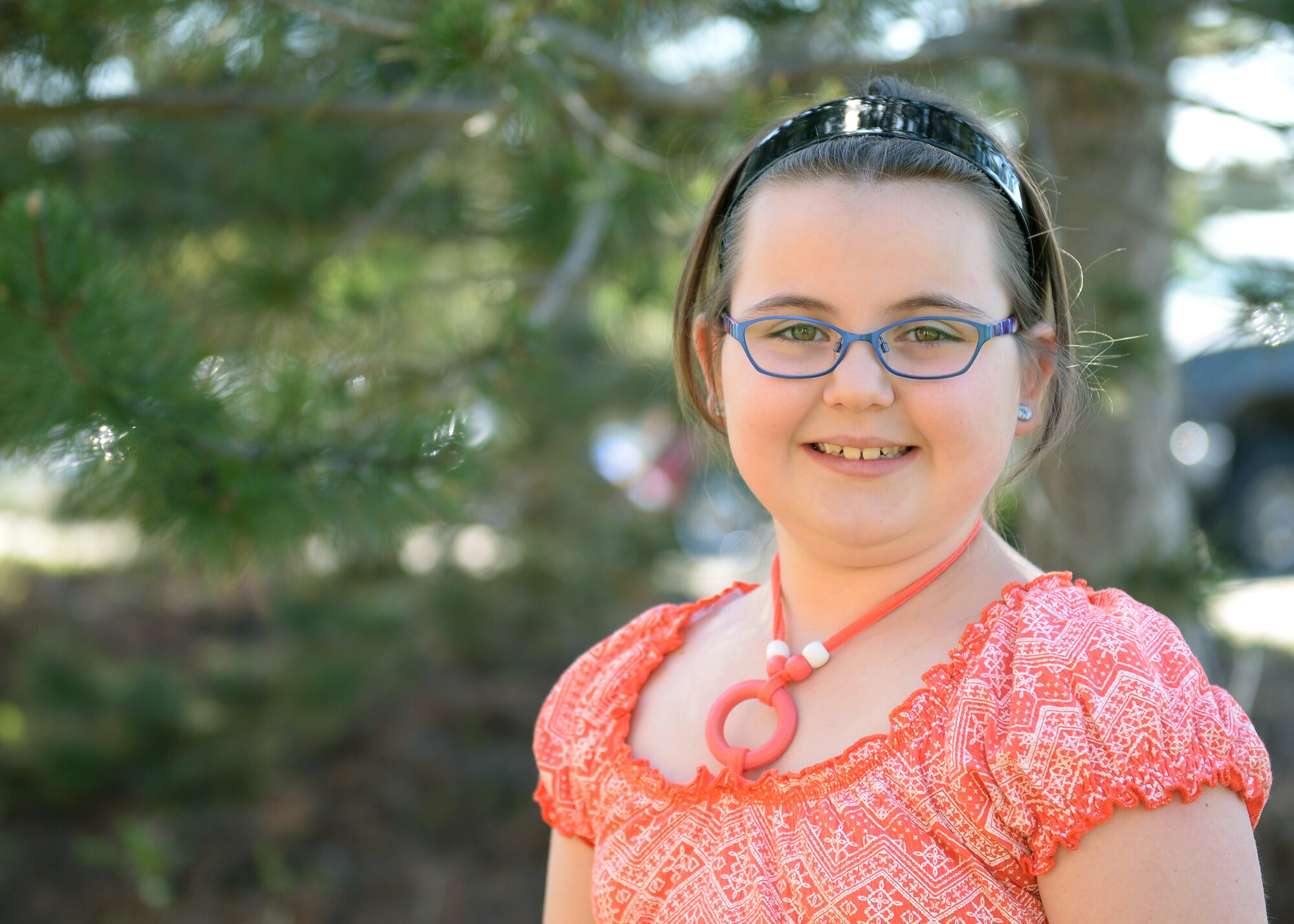 Clarrisa Loeseke, Age 7, Daughter of Senior Master Sgt. Shannon Loeseke, 9th Civil Engineer Squadron engineering flight superintendent, poses for a photo March 31, 2016, at Beale Air Force Base, California. (U.S. Air Force photo by Robert Scott)