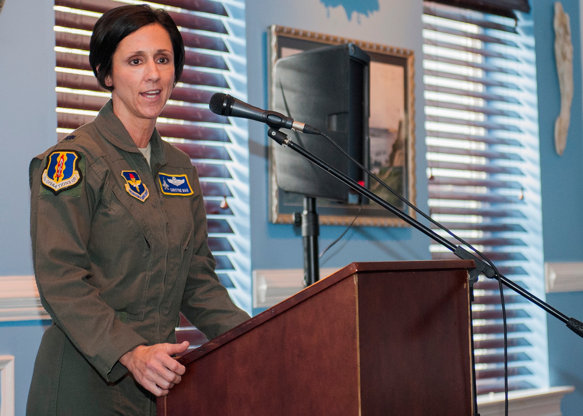 Lt. Col. Christine Mau, 33rd Fighter Wing Operations Group deputy commander, speaks during Eglin’s Women’s History Month luncheon March 31 in Valparaiso, Fla. Mau made aviation history here as the first female pilot to fly the F-35 Lighting II. (U.S. Air Force photo/Ilka Cole)