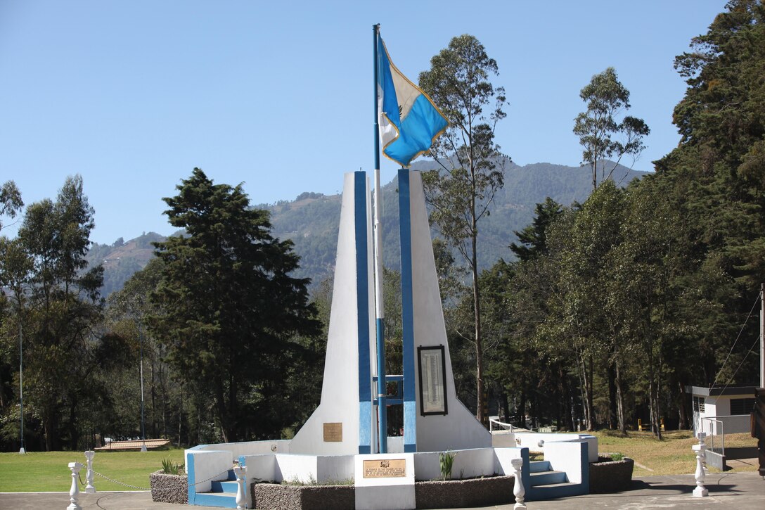 The Guatemalan flag flies at the Guatemalan Army Mountain Division Base at San Marcos, April 4th, 2016. Task Force Red Wolf and Army South conducts Humanitarian Civil Assistance Training to include tactical level construction projects and Medical Readiness Training Exercises providing medical access and building schools in Guatemala with the Guatemalan Government and non-government agencies from 05MAR16 to 18JUN16 in order to improve the mission readiness of US Forces and to provide a lasting benefit to the people of Guatemala. (U.S. Army photo by Sgt. Prosper Ndow/Released)