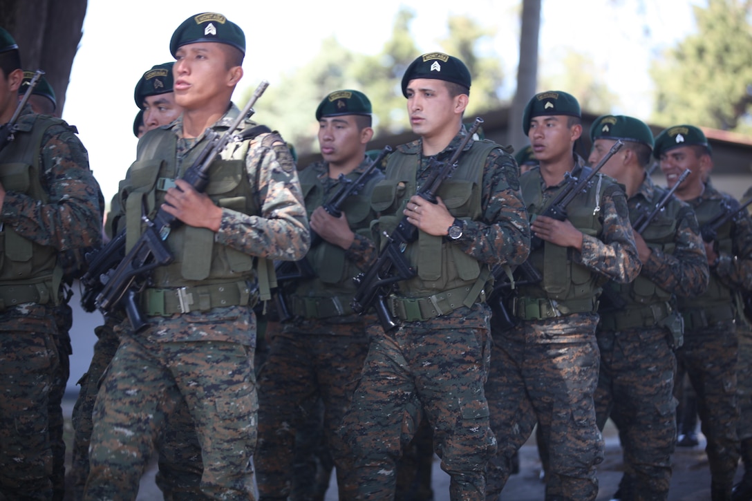 Guatemalan Army members march towards the ceremony location before the celabration to mark Guatemala's republic day at San Marcos, April 4th, 2016. Task Force Red Wolf and Army South conducts Humanitarian Civil Assistance Training to include tactical level construction projects and Medical Readiness Training Exercises providing medical access and building schools in Guatemala with the Guatemalan Government and non-government agencies from 05MAR16 to 18JUN16 in order to improve the mission readiness of US Forces and to provide a lasting benefit to the people of Guatemala. (U.S. Army photo by Sgt. Prosper Ndow/Released)