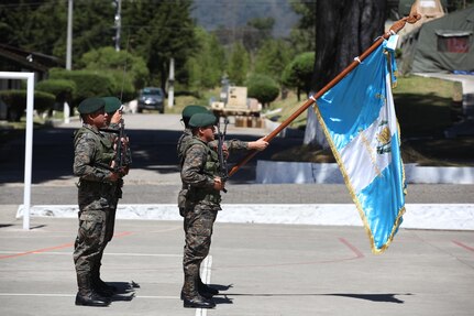 Guatemalan Army color guard present the national colors during the celebration for Guatemala's republic day at San Marcos, April 4th, 2016. Task Force Red Wolf and Army South conducts Humanitarian Civil Assistance Training to include tactical level construction projects and Medical Readiness Training Exercises providing medical access and building schools in Guatemala with the Guatemalan Government and non-government agencies from 05MAR16 to 18JUN16 in order to improve the mission readiness of US Forces and to provide a lasting benefit to the people of Guatemala. (U.S. Army photo by Sgt. Prosper Ndow/Released)