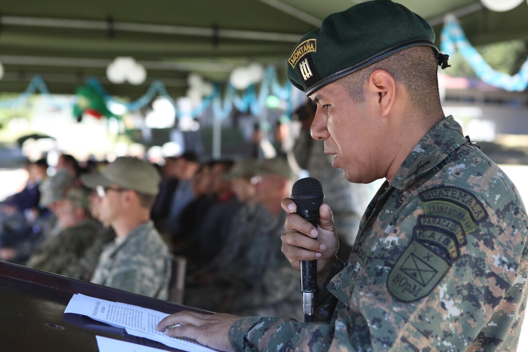 Guatemalan Army officer gives a speech during the celebration for Guatemala's republic day at San Marcos, April 4th, 2016. Task Force Red Wolf and Army South conducts Humanitarian Civil Assistance Training to include tactical level construction projects and Medical Readiness Training Exercises providing medical access and building schools in Guatemala with the Guatemalan Government and non-government agencies from 05MAR16 to 18JUN16 in order to improve the mission readiness of US Forces and to provide a lasting benefit to the people of Guatemala. (U.S. Army photo by Sgt. Prosper Ndow/Released)