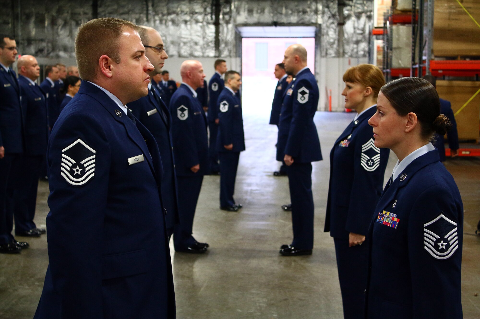 Reservists from the 445th Logistics Readiness Squadron conduct an open ranks inspection during the March 6, 2016 unit training assembly. 