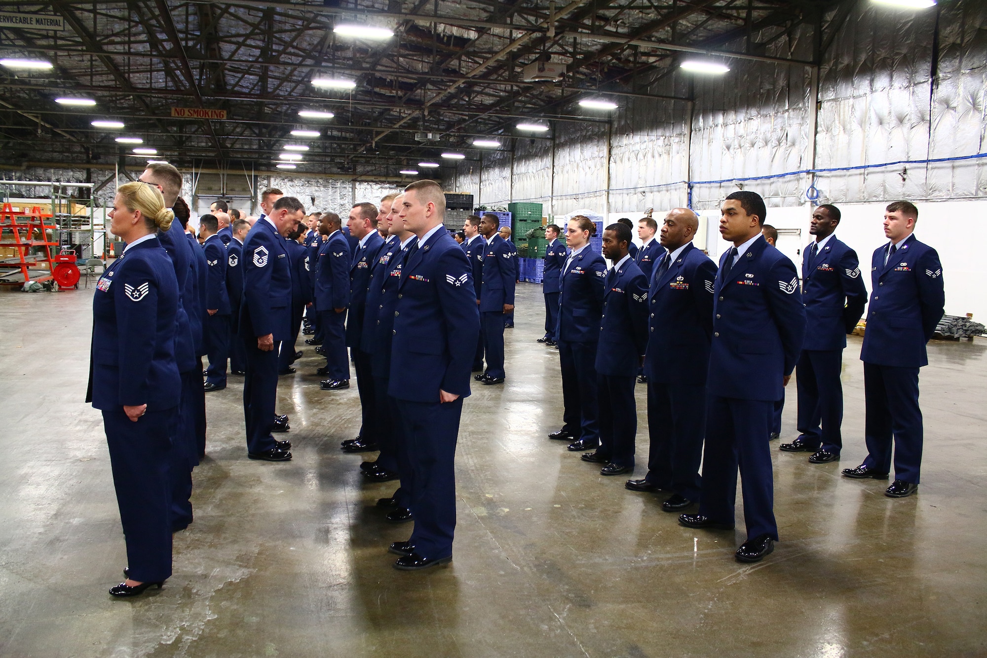 Reservists from the 445th Logistics Readiness Squadron conduct an open ranks inspection during the March 6, 2016 unit training assembly. 