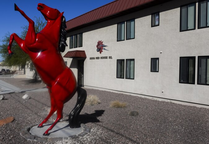 Located in the desert of Area 2, the 555th Red Horse Squadron is a small reserve unit that works with the 820th Red Horse Squadron here to accomplish a much larger mission at Nellis Air Force Base, Nev., April 3, 2016. The enthusiastic Airmen, even only working one weekend a month and two weeks a year, have provided crucial manpower and are a pivotal element in the overall construction of the firehouse. (U.S. Air Force photo by Airman 1st Class Kevin Tanenbaum)