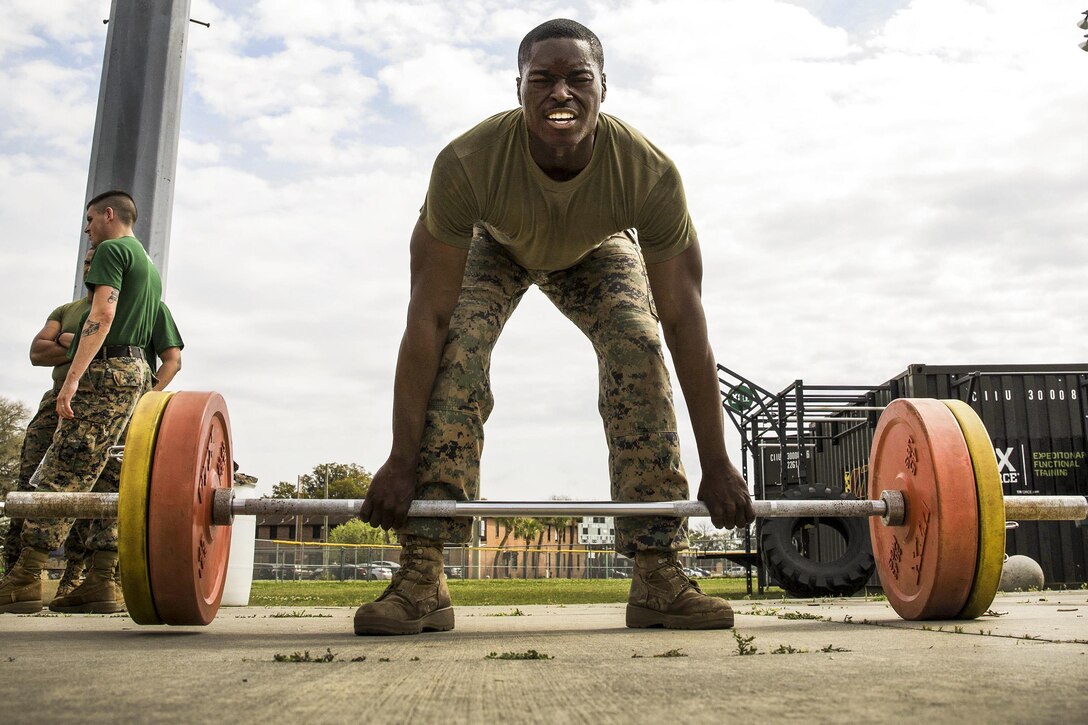 Marine Corps Sgt. Donovan Robinson participates in the dead lifts event during the Commanding General's Fitness Cup Challenge at Marine Corps Recruit Depot Parris Island, S.C., March 25, 2016. Robinson is a supply clerk assigned to Weapons and Field Training Battalion, Recruit Training Regiment. Marine Corps photo by Lance Cpl. Richard Currier
