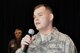 Tech. Sgt. Marshall Hunsaker, a broadcast journalist assigned to the 910th Airlift Wing Public Affairs Office sings God Bless America while Col. Bill Phillips, commander of the 910th Operations Group, looks on during a Youngstown Phantoms hockey game here, April 2, 2016. A group of Citizen Airmen, based at nearby Youngstown Air Reserve Station, Ohio, participated in YARS Night Out activities before and during the game. The Phantoms, a member of the United States Hockey League, defeated the Omaha Lancers 4-1 in front of a home ice crowd of more than 3000 fans. (Courtesy Photo/Deana Barko)