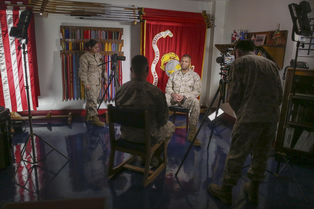 Marines from Defense Media Activity interview off-going and on coming Color Sergeants of the Marine Corps. (Official Marine Corps photo by Cpl. Chi Nguyen/Released)