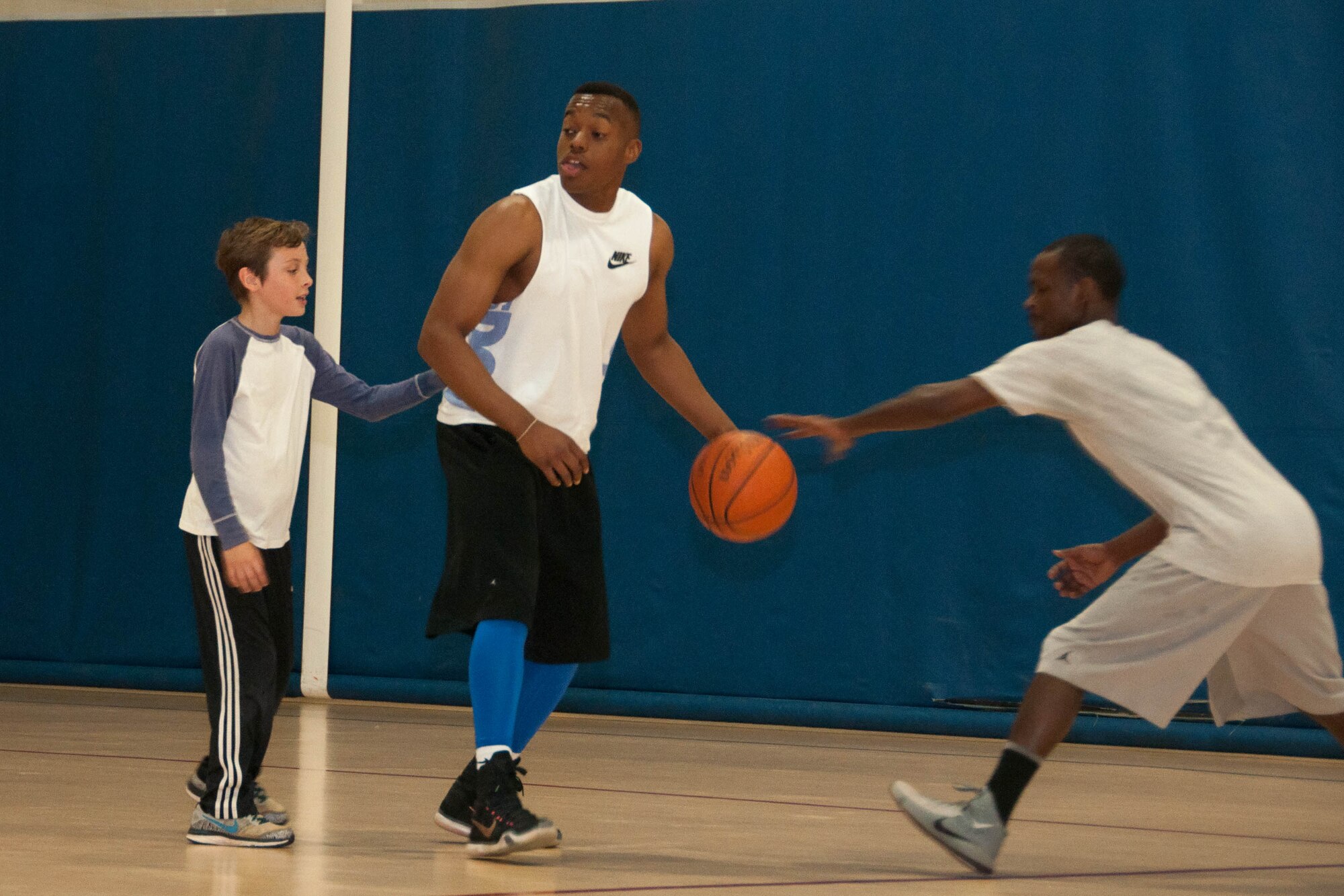 The competition was fierce during a basketball tournament at the Senior Airman Bryan Bell Fitness Center on Barksdale Air Force Base, La. on April 2nd. The four-on-four basketball tournament was part of the annual 307th Bomb Wing Family Day. (U.S. Air Force photo by Master Sgt. Laura Siebert/Released)