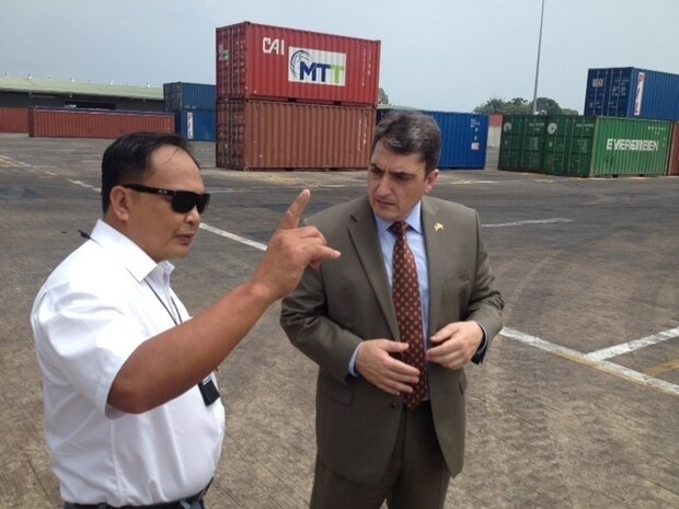 U.S. Coast Guard International Port Security representatives visit Muara Container Terminal and receive a detailed explanation regarding segregating and inspecting empty containers on the facility before they are
loaded on an outbound ship in Brunei in March. (U.S. Coast Guard photo by Activities Far East/Released)
