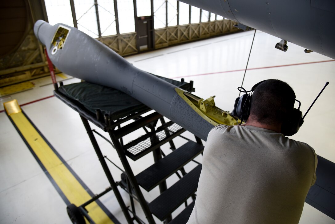 Staff Sgt. Ryan Stevenson, 92nd Maintenance Squadron aircraft hydraulic systems craftsman, installs a boom onto a KC-135 Stratotanker March 22, 2016, at Fairchild AFB, Wash. The hydraulics shop, often referred to as ‘hydro’, inspects, tests, services and overhauls hydraulic and aerial refueling components on the KC-135. (U.S. Air Force photo/Airman 1st Class Mackenzie Richardson)