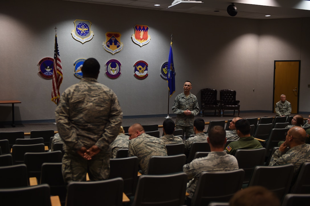 U.S. Air Force Chief Master Sgt. Todd Petzel, 18th Air Force command chief, speaks with 317th Airlift Group loadmasters, March 29, 2016, at Dyess Air Force Base, Texas. During his visit to Dyess, Petzel toured the 317th Operation Support Squadron, Child Development Center, C-130J simulator, Airmen and Family Readiness Center and viewed some of the Airmen’s dorms. (U.S. Air Force photo by Senior Airman Alexander Guerrero/Released)