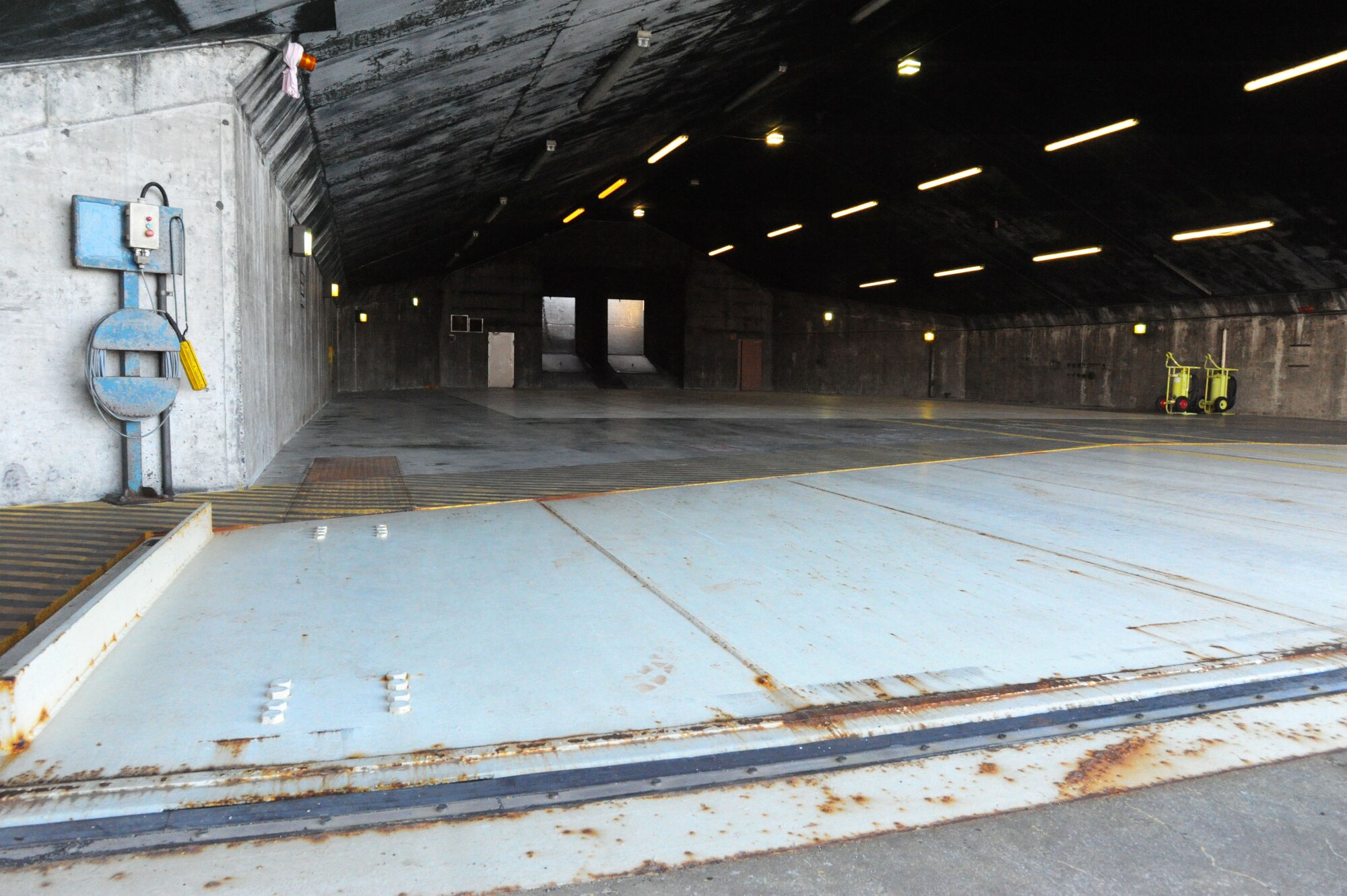A hardened aircraft shelter remains empty ahead of an arrival of U.S. Air Force F-15C Eagle fighter aircraft from the 131st Fighter Squadron, Barnes Air National Guard Base, Mass., to Keflavik International Airport, Iceland, April 2, 2016. The Icelandic and U.S. Air Forces work side-by-side as NATO partners to meet potential security challenges by annually conducting Icelandic Air Surveillance operations. (U.S. Air Force photo by Master Sgt. Kevin Nichols/Released)