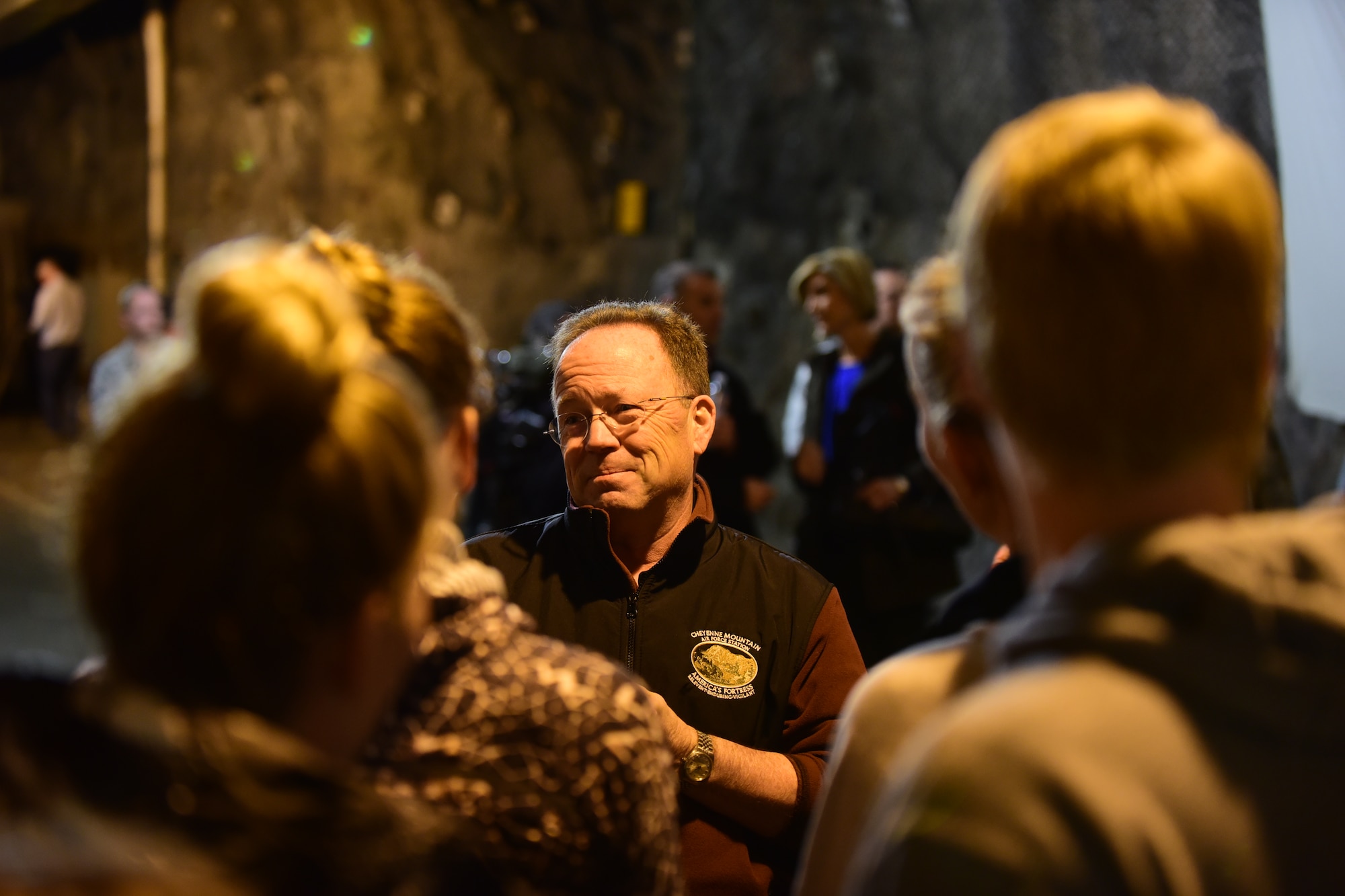 CHEYENNE MOUNTAIN AIR FORCE STATION – Steven Rose, 721st Mission Support Group deputy director, answers questions from the U.S. National Swim Team during a tour of the facilities here March 30, 2016. The visit and tour was part of the ongoing 50th Anniversary celebration for CMAFS. The installation was declared fully operational April 20, 1966. (U.S. Air Force photo by Staff Sgt. Amber Grimm)