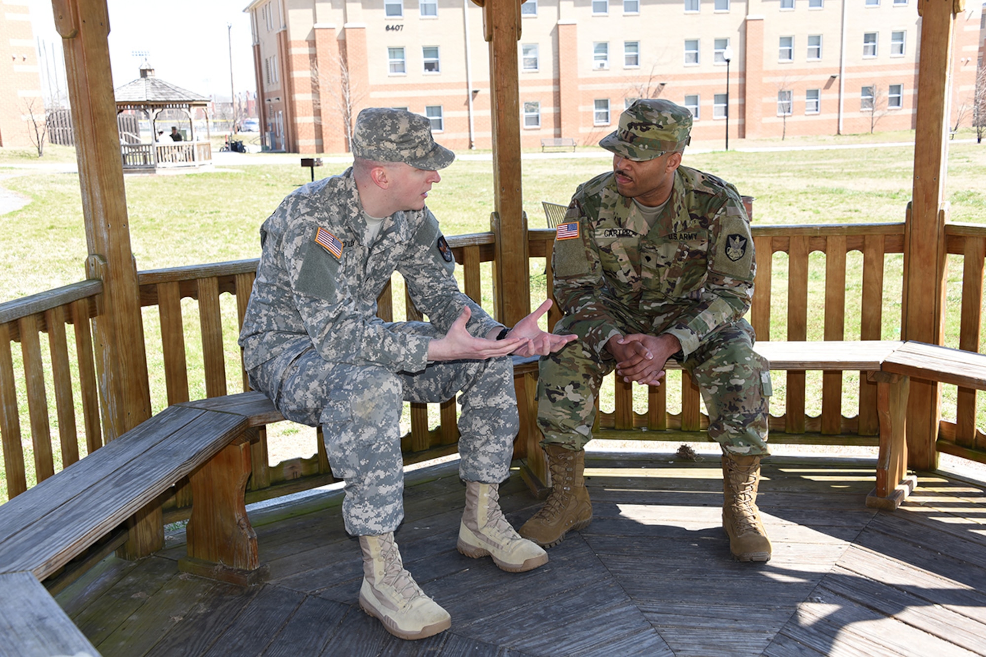 FORT MEADE, Md. – Spc. Robert Carter, 4th Space Company, 1st Space Battalion, right, listens to Spc. Robert O’Leary during a role-play scenario March 22 during the U.S. Army Space and Missile Defense Command/Army Forces Strategic Command’s Eastern Region Best Warrior Competition March 21-24 at Fort Meade, Maryland. In the event, Carter had to counsel O’Leary during his crisis. (Photos by Carrie E. David )