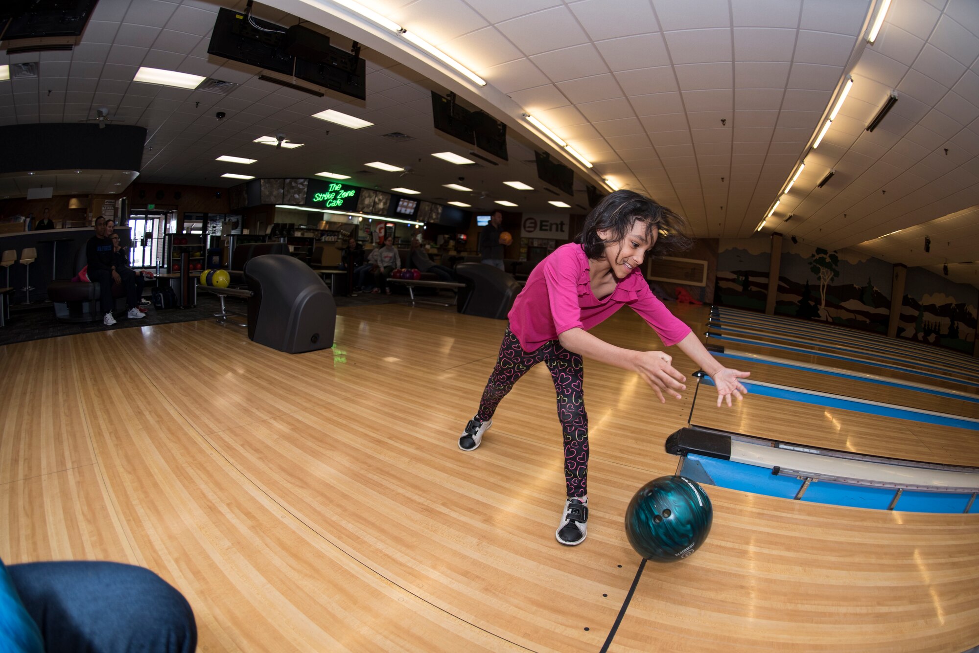 PETERSON AIR FORCE BASE, Colo. – Malaina Jackson, daughter of Lt. Col. Marcus Jackson, National Reconnaissance Office Operations Squadron commander, participates in the Celebrate Easter event at the Peterson Bowling Center here March 26, 2016. The bowling center is one of several events Peterson AFB offers during Easter. The Peterson Club held an Easter brunch and the Youth Center held an Easter Egg-Stravaganza egg hunt. (U.S. Air Force photo by Airman 1st Class Dennis Hoffman)