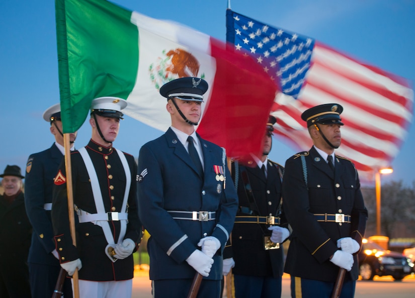 Joint Color Guard members prepare for the Mexican Presidential arrival on the Joint Base Andrews flightline, March 31, 2016. More than 20 countries are scheduled to arrive for the 2016 Nuclear Security Summit held in Washington, D.C. The summit provides a forum for leaders to reinforce commitments to securing nuclear materials. (U.S. Air Force photo by Staff Sgt. Chad C. Strohmeyer/RELEASED)
