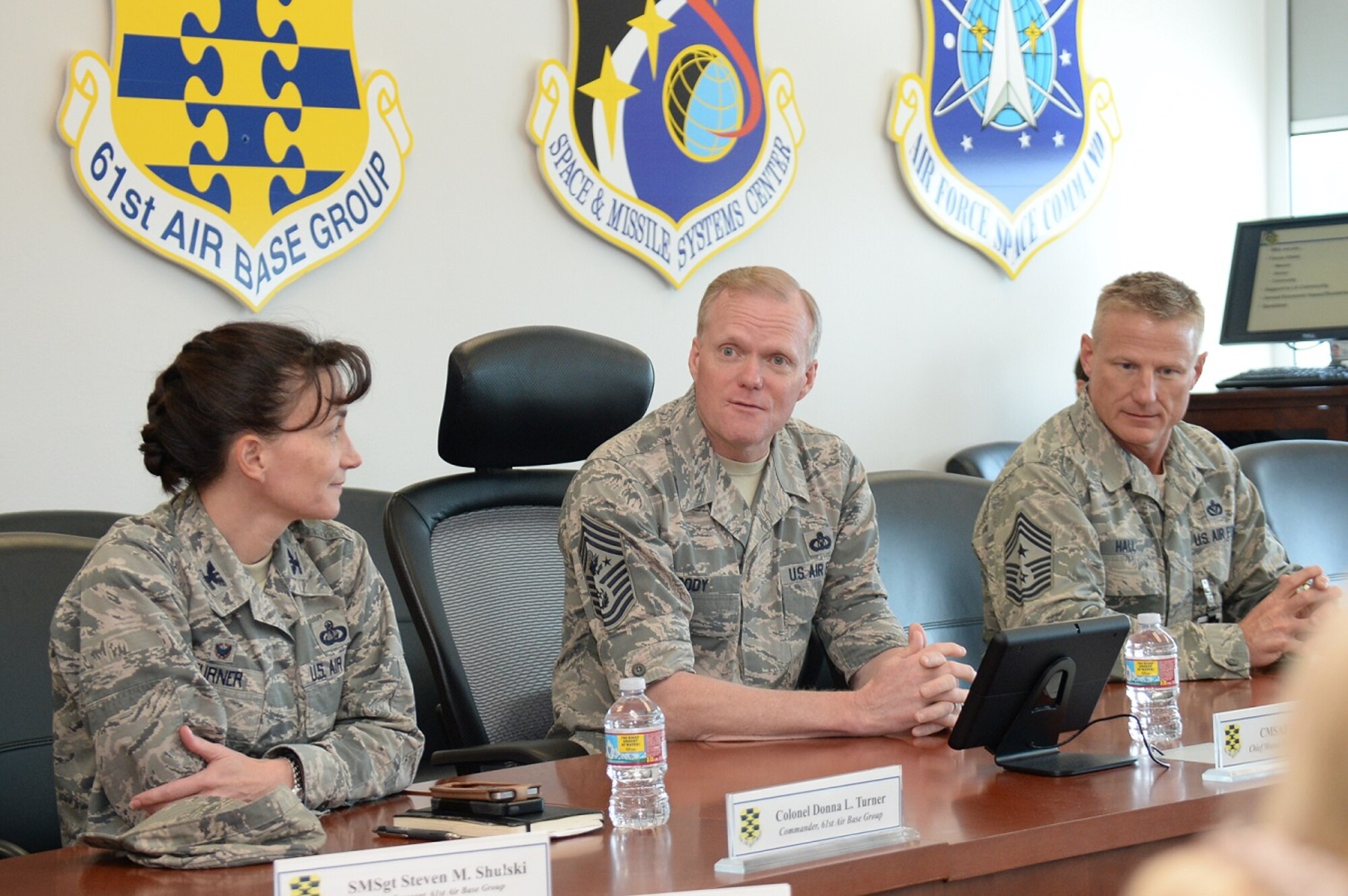 Chief Master Sgt. of the Air Force James A. Cody (center) fields questions from Col. Donna Turner, 61st Air Base Group commander and Chief Master Sgt. Craig Hall, Space and Missile Systems Center command chief, during a visit to Los Angeles Air Force Base in El Segundo, Calif., March 9-11, 2016 to discuss the current state of the Air Force from an enlisted perspective. The CMSAF's visit offered active duty and civilian personnel a rare opportunity to directly address the service’s senior enlisted leader regarding the issues facing today’s Airmen. It also gave Chief Cody a chance to view the unique characteristics of Los Angeles AFB and the capabilities the Total Force offers to accomplish the SMC mission. (U.S. Air Force photo/Van De Ha)